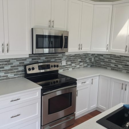 Glass and Stone Mosaic Tile Backsplash - Condo Kitchen