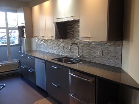 Glass, Metal and Stone Backsplash - Oak Bay Ave.