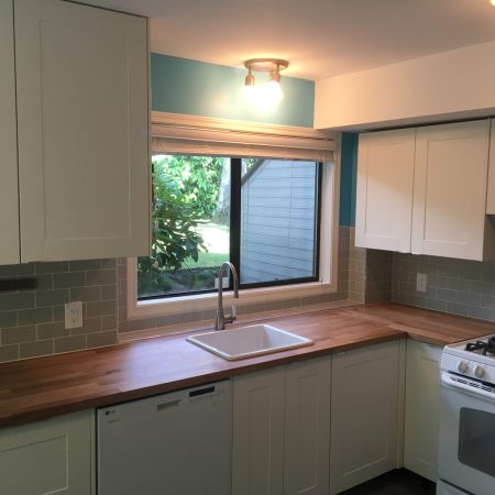 Blue Subway Tile Kitchen Backsplash with Windowsill Detail