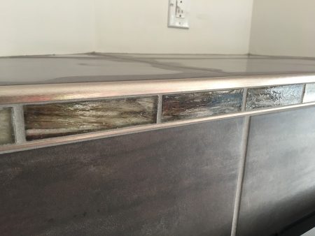 Corner Fireplace with Glass Mosaic Tile Accent Band, Schluter Rondec and Gas Insert - Detail - Dean Park