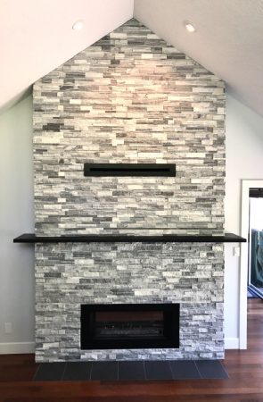 Double Sided Ledgestone Tile Fireplace with Charred Wood Mantle and See-Through Gas Insert with Heat Shift Vent Side 1 - Broadmead
