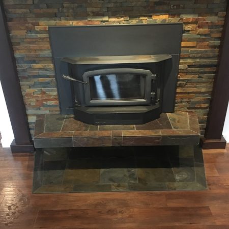Slate and Ledgestone Fireplace Surround and Hearth with Wood Stove Insert - Victoria BC