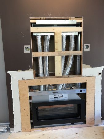 Double Sided Ledgestone Tile Fireplace with Charred Wood Mantle and See-Through Gas Insert with Heat Shift Vent Internals Detail - Broadmead