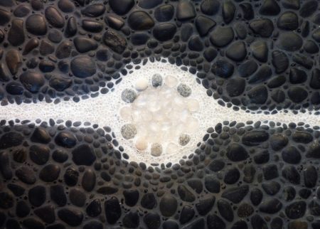 pebble shower pan with quartz crystals