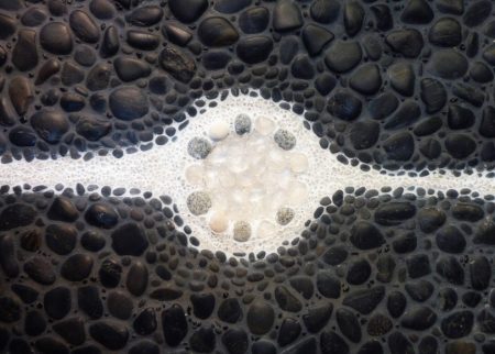 pebble shower pan with quartz crystals