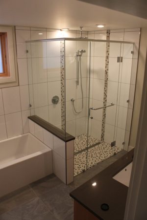 Walk In Shower with Line Drain and Vertical Mosaic Tile Accent Bands - Oak Bay