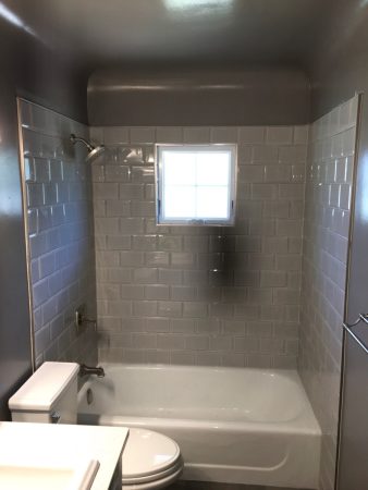 Grey Bevelled Tile Shower with Window - Ross Bay