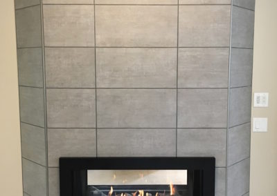 Tile Fireplace Surround with Schluter Rondec, Double Sided Heat Shift Gas Insert - Broadmead