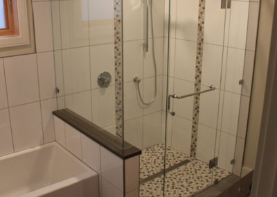 Walk In Shower with Line Drain and Vertical Mosaic Tile Accent Bands - Oak Bay