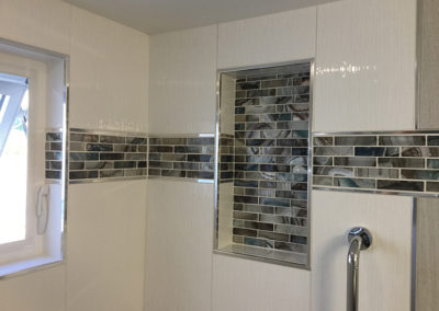 Bathroom Tile with Accent Band and Niche Box Framed with Schluter Quadec - Quadra St.