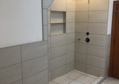 Walk In Shower with Niche Box and Tileable Drain - Shawnigan Lake School