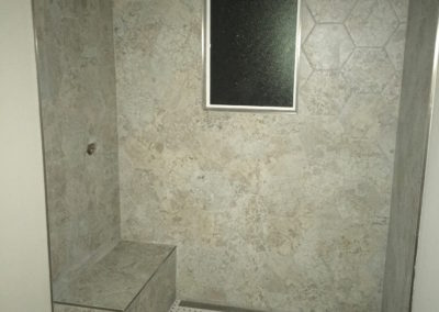 Curbless Shower with Bench, Line Drain, Mosaic Tile Floor and Hex Tile Walls, Window - Salt Spring Island