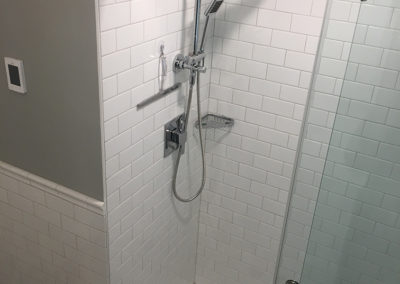 Subway Tile Shower with Hex Mosaic Floor, In Floor Heat and Chair Rail Profile - Oak Bay
