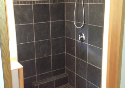 Slate Corner Shower with Accent Band and Drypack Pan - Oldfield Rd.
