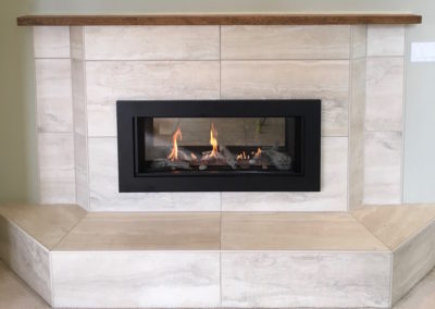 Large Format Tile Fireplace with Schluter Rondec Edge, Heat Shift Double Sided Gas Insert - Broadmead