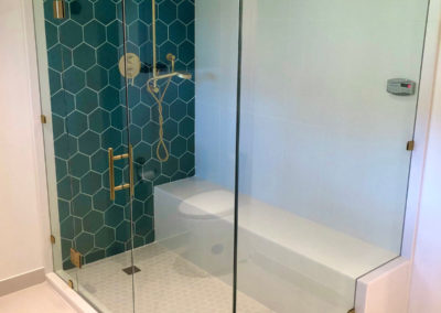 Blue Hexagon Tile with Brass Accents Steam Room  - Maplewood