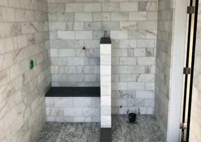 White marble tile bathroom - Metchosin
