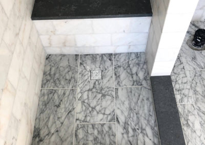 White marble bathroom shower pan tile - Metchosin
